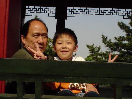 Friendly Chinese songbird and his granddad