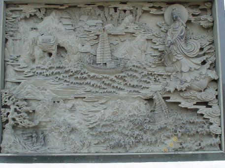 Carving of the tale of Guānyīn's arrival on Pŭtu&oacute;shān