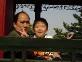 Friendly Chinese songbird and his granddad