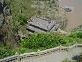 Looking down on F&agrave;nyīn Cave (F&agrave;nyīn D&oacute;ng, 梵音洞) which is actually more of a crevice